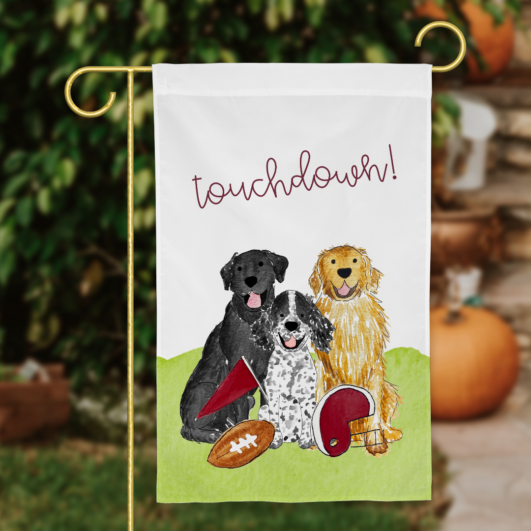 Pet Football Garden Flag featuring a spaniel, golden retriever, and black lab on a football field. Football garden flag, football garden flags, pet garden flag, pet football jersey, football garden flags, best football garden flag, outdoor football garden flag, sports garden flags, fall football garden flag, college football garden flags, dog garden flag, dog football field