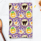 A purple Halloween kitchen towel with a pattern of watercolor slice and bake halloween cookies surrounded by Halloween sprinkles. halloween kitchen towel, halloween kitchen towels, halloween slice and bake cookies kitchen towel, halloween dish towel, halloween tea towels, halloween towels for kitchen