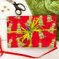 Festive Christmas Apricot Doodle Gift Wrap - Red